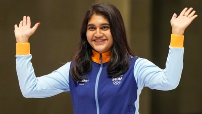 India shooter Esha Singh reacts while receiving the medal after the finals of women's 10m air pistol (individual) event at the 19th Asian Games (PTI)