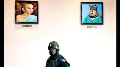 Portraits of Kautilya, also known as Chanakya, and Chinese strategist Sun Tzu inside the border personnel meeting hut at the Line of Actual Control in Bum La in Arunachal Pradesh. (HT File Photo/Rahul Singh) Portraits of Kautilya, also known as Chanakya, and Chinese strategist Sun Tzu inside the border personnel meeting hut at the Line of Actual Control in Bum La in Arunachal Pradesh. (HT File Photo/Rahul Singh)