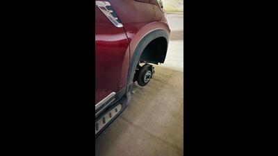 Vyom Kaushik, a resident of Paras Tierea apartments in Sector 137, was about to head to work around 9am on Friday and had reached the basement 2 parking of his tower, only to find all four tyres of his Kia Sonet missing. (HT Photo)