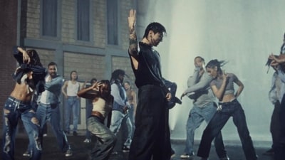 Jungkook in the music video for 3D. Jack Harlow also features in it.