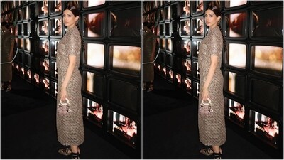 Khushi is dressed from head to toe in Dior. Her outfit consisted of a golden shirt featuring a collared neckline, half sleeves, a buttoned bodice and mirror embellishments all over. She paired it with a matching pencil skirt. (Instagram/@khushi05k) Khushi is dressed from head to toe in Dior. Her outfit consisted of a golden shirt featuring a collared neckline, half sleeves, a buttoned bodice and mirror embellishments all over. She paired it with a matching pencil skirt. (Instagram/@khushi05k)