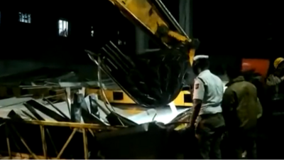A fire force team and police personnel reached the spot and began removing the debris after the petrol pump roof collapsed in Chennai on Friday. (ANI) A fire force team and police personnel reached the spot and began removing the debris after the petrol pump roof collapsed in Chennai on Friday. (ANI)