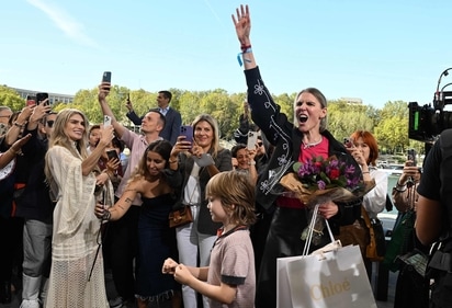 Designer Gabriela Hearst (C) gestures at the end of the Chloe fashion show during the Paris Fashion Week Womenswear Spring/Summer 2024, in Paris on September 28, 2023. (Photo by Bertrand GUAY / AFP) Designer Gabriela Hearst (C) gestures at the end of the Chloe fashion show during the Paris Fashion Week Womenswear Spring/Summer 2024, in Paris on September 28, 2023. (Photo by Bertrand GUAY / AFP)