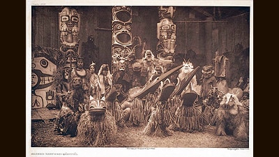 A potlatch ceremony conducted by the Kwakiutl people of the Pacific Northwest, photographed by Edward S Curtis and published between 1907 and 1930. (Wikimedia Commons) A potlatch ceremony conducted by the Kwakiutl people of the Pacific Northwest, photographed by Edward S Curtis and published between 1907 and 1930. (Wikimedia Commons)