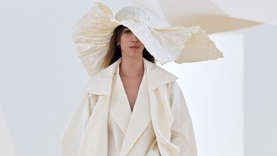 A model presents a creation for the Japanese Fashion House Issey Miyake during a show as part of the Paris Fashion Week Womenswear Spring/Summer 2024 in Paris. (Photo by Miguel MEDINA / AFP) A model presents a creation for the Japanese Fashion House Issey Miyake during a show as part of the Paris Fashion Week Womenswear Spring/Summer 2024 in Paris. (Photo by Miguel MEDINA / AFP)