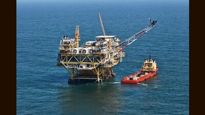 FILE - This April 10, 2011, file photo, shows a rig and supply vessel in the Gulf of Mexico, off the coast of Louisiana. The Biden administration on Friday proposed up to three oil and gas lease sales in the Gulf of Mexico over the next five years — and none in Alaska — as it tries to navigate between energy companies that have pressed for greater oil and gas production and environmental activists who have urged President Joe Biden to shut down new offshore drilling in the fight against climate change. (AP Photo/Gerald Herbert, File) (AP) FILE - This April 10, 2011, file photo, shows a rig and supply vessel in the Gulf of Mexico, off the coast of Louisiana. The Biden administration on Friday proposed up to three oil and gas lease sales in the Gulf of Mexico over the next five years — and none in Alaska — as it tries to navigate between energy companies that have pressed for greater oil and gas production and environmental activists who have urged President Joe Biden to shut down new offshore drilling in the fight against climate change. (AP Photo/Gerald Herbert, File) (AP)