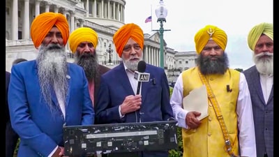 Media spokesman of Sikh Coordination Committee East Coast Harjinder Singh along with granthi Giani Jaswinder Singh (in yellow outfit) speaks to the media on US Congress House Session starting with Sikh prayer for first time in history, in Washington DC on Saturday. (ANI) Media spokesman of Sikh Coordination Committee East Coast Harjinder Singh along with granthi Giani Jaswinder Singh (in yellow outfit) speaks to the media on US Congress House Session starting with Sikh prayer for first time in history, in Washington DC on Saturday. (ANI)