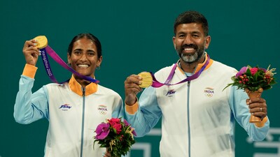 India's gold medalists Rutuja Sampatrao Bhosale and Rohan Bopanna pose with the medals after winning the Mixed Doubles Final tennis match against Chinese Taipei's Liang En-shuo and Tsung-Hao Huang (PTI) India's gold medalists Rutuja Sampatrao Bhosale and Rohan Bopanna pose with the medals after winning the Mixed Doubles Final tennis match against Chinese Taipei's Liang En-shuo and Tsung-Hao Huang (PTI)