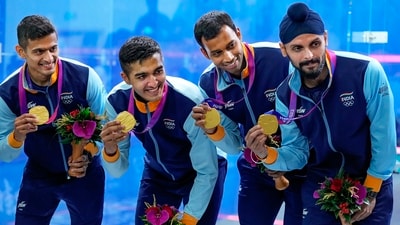 Gold medallists Saurav Ghosal, Abhay Singh, Mahesh Mangaonkar and Harinder Pal Sandhu pose for photos during the presentation ceremony of the Squash Men's Team event at the 19th Asian Games (PTI) Gold medallists Saurav Ghosal, Abhay Singh, Mahesh Mangaonkar and Harinder Pal Sandhu pose for photos during the presentation ceremony of the Squash Men's Team event at the 19th Asian Games (PTI)