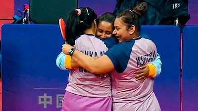 India's table tennis players Sutirtha Mukherjee and Ayhika Mukherjee celebrate after winning the women's doubles quarterfinal match against China's Chen Meng and Wang Yidi at the 19th Asian Games (PTI) India's table tennis players Sutirtha Mukherjee and Ayhika Mukherjee celebrate after winning the women's doubles quarterfinal match against China's Chen Meng and Wang Yidi at the 19th Asian Games (PTI)