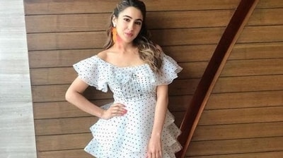 Sara Ali Khan, the Gen Z style icon, wore a stylish polka dot dress with an off-the-shoulder ruffled neckline and multiple ruffles at the hem. The fluorescent orange earring and its abstract design added the oomph factor to her look. If you're looking for a casual summer dress, then Sara's chic polka dot dress could be your perfect style inspiration. (Instagram)
