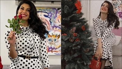 Jacqueline Fernandez's white and black polka dot dress is the epitome of glamour and elegance. Her dress features a short neckline, full sleeves, maxi length and a sleek belt at the wrist. With nude eyeshadow, mascaraed lashes, contoured cheeks and a swipe of bright red lipstick, she looked stunning. Styled with a red Dior mini bag, oversized pearl earrings and pumps, she sets the fashion tone. (Instagram)