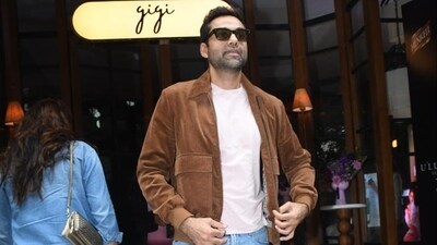 Abhay Deol made a rare appearance at the brunch on Saturday. He was in a white T-shirt, blue denims paired with a brown jacket. He was seen this year in the film Trial By Fire which was based on the Uphaar fire tragedy. Abhay Deol made a rare appearance at the brunch on Saturday. He was in a white T-shirt, blue denims paired with a brown jacket. He was seen this year in the film Trial By Fire which was based on the Uphaar fire tragedy. 