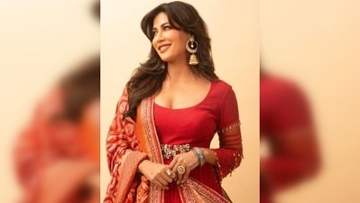 Chitrangda Singh's outfit featured an embellished anarkali with a waist belt and tassels on the sleeves, accompanied by a sequin-worked dupatta. (Instagram/@chitrangda) Chitrangda Singh's outfit featured an embellished anarkali with a waist belt and tassels on the sleeves, accompanied by a sequin-worked dupatta. (Instagram/@chitrangda)
