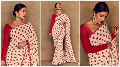 What could be more stylish than a polka dot saree? With the festive season upon us, a gorgeous saree adorned with chic polka dot patterns can be your perfect ethnic look. Priyanka Chopra showed off the beauty of the six yards of grace in this Sabyasachi creation with a red polka print on a white background, paired with a full-sleeved red silk blouse. Finally, statement earrings and a sleek, centre-parted bun completed her outfit. Priyanka's polka dot outfit is all the festive outfit inspiration you need. (Instagram/@priyankachopra)