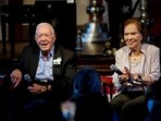 FILE PHOTO: Former U.S. President Jimmy Carter and his wife, former first lady Rosalynn Carter sit together .John Bazemore/Pool via REUTERS/File Photo