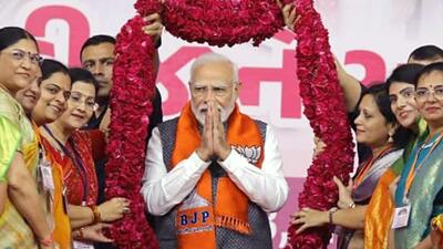 Ahmedabad, Sep 26 (ANI): Prime Minister Narendra Modi being garlanded by BJP women supporters during the Nari Shakti Vandan - Abhinandan Karyakram, in Ahmedabad on Tuesday. (ANI Photo) (Bhupendra Patel twitter)