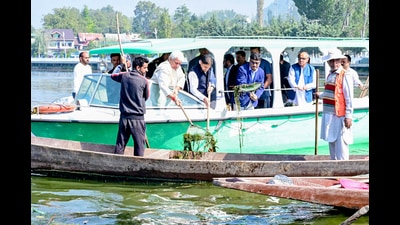 Jammu and Kashmir lieutenant governor Manoj Sinha on Sunday participated in a citizen-led sanitation campaign at Dal Lake in Srinagar. (Photo:X) Jammu and Kashmir lieutenant governor Manoj Sinha on Sunday participated in a citizen-led sanitation campaign at Dal Lake in Srinagar. (Photo:X)