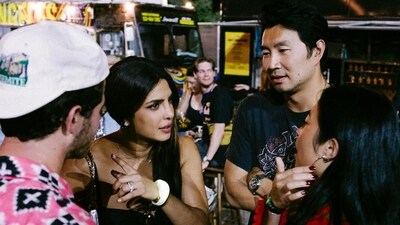 Priyanka Chopra with Nick Jonas and Simu Liu at a Jonas Brothers show. Priyanka Chopra with Nick Jonas and Simu Liu at a Jonas Brothers show.