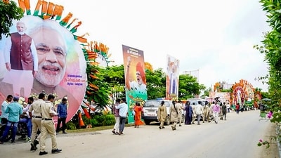 Hoardings and posters of Prime Minister Narendra Modi put up for his public meeting in Mahabubnagar district, Sunday. (PTI) Hoardings and posters of Prime Minister Narendra Modi put up for his public meeting in Mahabubnagar district, Sunday. (PTI)