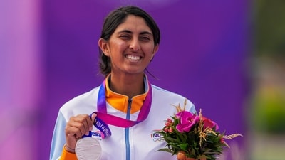 India's silver medalist Aditi Ashok poses with her medal during the presentation ceremony (PTI) India's silver medalist Aditi Ashok poses with her medal during the presentation ceremony (PTI)