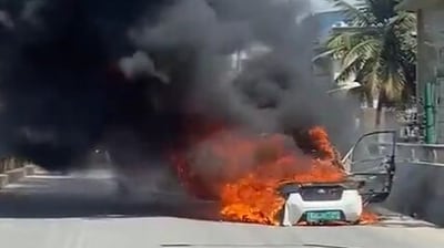 Electric car catches fire in Bengaluru (X/Rakesh Prakash) Electric car catches fire in Bengaluru (X/Rakesh Prakash)