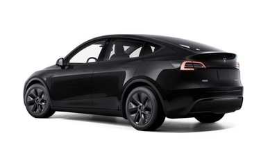 Tesla unveiled a restyled Model 3 with a longer driving range, manufactured at its Shanghai factory in September (TESLA )