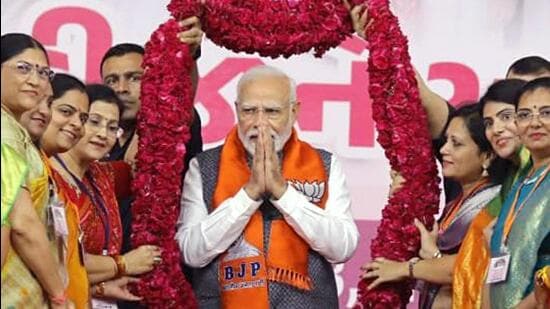 Ahmedabad, Sep 26 (ANI): Prime Minister Narendra Modi being garlanded by BJP women supporters during the Nari Shakti Vandan - Abhinandan Karyakram, in Ahmedabad on Tuesday. (ANI Photo) (Bhupendra Patel twitter)