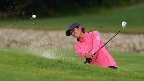 Aditi Ashok of India plays a shot from a bunker. (Getty Images)