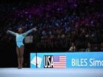 US' Simone Biles competes during the women's qualifying session at the 52nd FIG Artistic Gymnastics World Championships