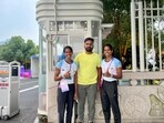 Vithya and Nithya Ramraj with coach Nehpal Singh Rathore Vithya and Nithya Ramraj with coach Nehpal Singh Rathore