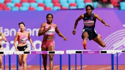 Bahrain's Aminat Oluwaseun Yusuf Jamal, center, competes with India's Vithya Ramraj, right, during the women's 400-meter hurdles heat at the 19th Asian Games (AP) Bahrain's Aminat Oluwaseun Yusuf Jamal, center, competes with India's Vithya Ramraj, right, during the women's 400-meter hurdles heat at the 19th Asian Games (AP)