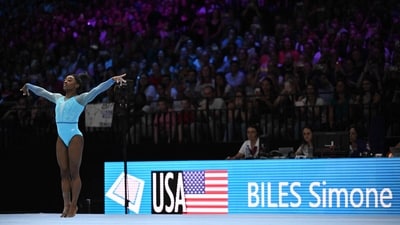 US' Simone Biles competes during the women's qualifying session at the 52nd FIG Artistic Gymnastics World Championships (AFP)