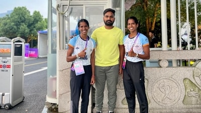 Vithya and Nithya Ramraj with coach Nehpal Singh Rathore Vithya and Nithya Ramraj with coach Nehpal Singh Rathore