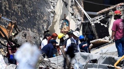 Rescuers and members of Civil Protection work amid the rubble after the roof of a church came crashing down on a baptism in Ciudad Madero, Tamapulipas state, Mexico, on October 2, 2023. (AFP) Rescuers and members of Civil Protection work amid the rubble after the roof of a church came crashing down on a baptism in Ciudad Madero, Tamapulipas state, Mexico, on October 2, 2023. (AFP)