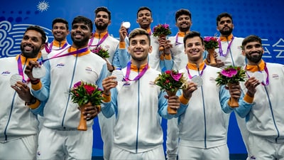 Hangzhou: Silver medallist Indian players pose for photos during the presentation ceremony of the Men's Team badminton event at the 19th Asian Games, in Hangzhou, China, Sunday, Oct. 1, 2023. (PTI Photo/Gurinder Osan) (PTI) Hangzhou: Silver medallist Indian players pose for photos during the presentation ceremony of the Men's Team badminton event at the 19th Asian Games, in Hangzhou, China, Sunday, Oct. 1, 2023. (PTI Photo/Gurinder Osan) (PTI)