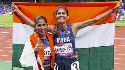 Parul Chaudhary and Priti Lamba celebrate after winning the silver and bronze medal respectively in the women's 3000m steeplechase final at the 19th Asian Games in Hangzhou (PTI) Parul Chaudhary and Priti Lamba celebrate after winning the silver and bronze medal respectively in the women's 3000m steeplechase final at the 19th Asian Games in Hangzhou (PTI)