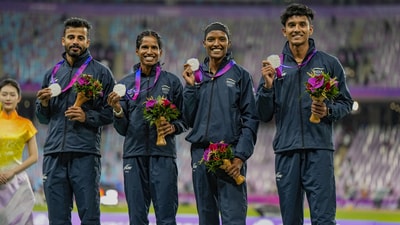 Silver medallist Muhammed Ajmal Variyathodi, Subha Venkatesan, Vithya Ramraj and Rajesh Ramesh pose for photo during the presentation ceremony of 4x400 Relay Mixed final event at the 19th Asian Games (PTI) Silver medallist Muhammed Ajmal Variyathodi, Subha Venkatesan, Vithya Ramraj and Rajesh Ramesh pose for photo during the presentation ceremony of 4x400 Relay Mixed final event at the 19th Asian Games (PTI)