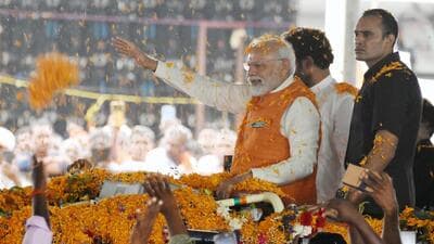 Prime Minister Narendra Modi waves to the supporters during a public meeting, in Mahbubnagar on October. (ANI) Prime Minister Narendra Modi waves to the supporters during a public meeting, in Mahbubnagar on October. (ANI)