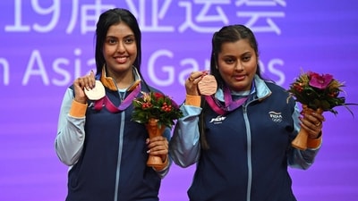 Bronze medallists Sutirtha and Ayhika Mukherjee pose during the medal ceremony for the women's double table tennis event at the Asian Games (AFP) Bronze medallists Sutirtha and Ayhika Mukherjee pose during the medal ceremony for the women's double table tennis event at the Asian Games (AFP)