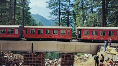 The first toy train on Kalka-Shimla heritage track departs Shimla after almost three months following its successful trial on the first plate girder bridge of which collapsed due to floods occurred in August last year, on Monday. (ANI)