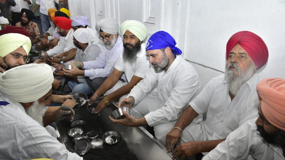 Congress leader Rahul Gandhi doing seva (voluntary service) at the community kitchen of the Golden Temple on Monday. (Sameer Sehgal/HT) Congress leader Rahul Gandhi doing seva (voluntary service) at the community kitchen of the Golden Temple on Monday. (Sameer Sehgal/HT)