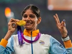 Gold medallist Parul Chaudhary poses for photo during the presentation ceremony of the women's 5000m athletics event at the 19th Asian Games(PTI)