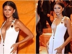 Zendaya attends the Louis Vuitton Paris Fashion Week show in a daring white gown with a front slit. 