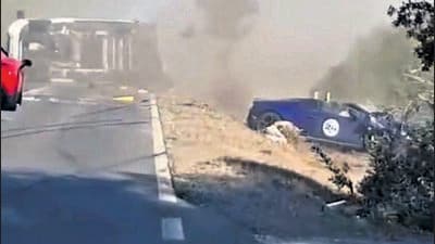 A video, shot from a vehicle driving behind the campervan, shows the Ferrari ramming the Lamborghini into the campervan, which turned turtle and blocked the highway. The Ferrari was engulfed in fire after the accident, killing its occupants - Swiss couple Melissa and Markus Krautli, aged 63 and 67, according to a report on Italian media website LaUnioneSarda.it (HT PHOTO)