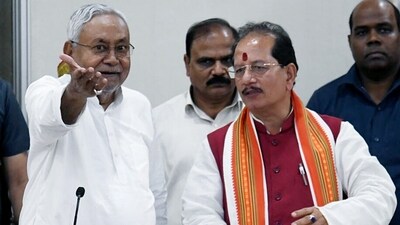Bihar Chief Minister Nitish Kumar with BJP Leader of opposition Vijay Kumar Sinha (ANI) Bihar Chief Minister Nitish Kumar with BJP Leader of opposition Vijay Kumar Sinha (ANI)