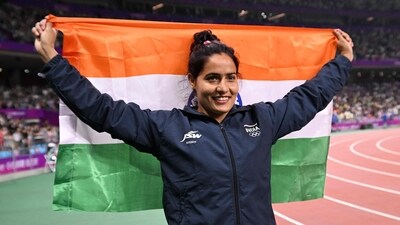 Gold medallist Annu Rani celebrates after the women's javelin throw final athletics event during the 2022 Asian Games in Hangzhou (AFP)
