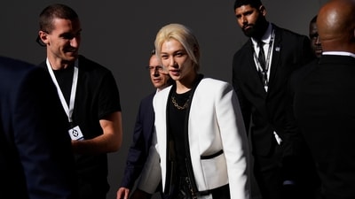 Singer Felix leaves after the Louis Vuitton show. As guests entered, they encountered an ephemeral installation — a vast, expanding balloon structure that melded with the walls. But as avant-garde as it was, the installation’s plastic, coupled with an autumnal heat wave, had some attendees likening it to a fashionable, yet sweltering, greenhouse. (AP) Singer Felix leaves after the Louis Vuitton show. As guests entered, they encountered an ephemeral installation — a vast, expanding balloon structure that melded with the walls. But as avant-garde as it was, the installation’s plastic, coupled with an autumnal heat wave, had some attendees likening it to a fashionable, yet sweltering, greenhouse. (AP)