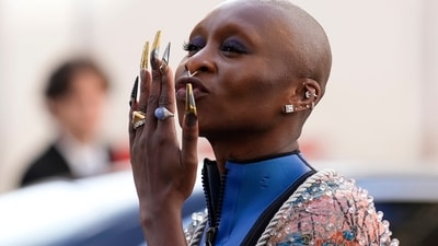 Cynthia Erivo arrives in a bedazzled outfit. It was more than just another fashion show in the City of Light. Louis Vuitton’s latest extravaganza on Paris’ most famous avenue, the Champs-Elysées, transformed an iconic 19th-century art nouveau space into an evolving artwork. (AP) Cynthia Erivo arrives in a bedazzled outfit. It was more than just another fashion show in the City of Light. Louis Vuitton’s latest extravaganza on Paris’ most famous avenue, the Champs-Elysées, transformed an iconic 19th-century art nouveau space into an evolving artwork. (AP)