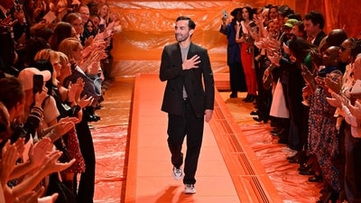 Louis Vuitton transformed the iconic 19th-century art nouveau space, Champs-Elysées, into an evolving artwork for the Spring-Summer 2024 show. French designer Nicolas Ghesquiere came out to acknowledge the attendees at the end of the show. (AFP) Louis Vuitton transformed the iconic 19th-century art nouveau space, Champs-Elysées, into an evolving artwork for the Spring-Summer 2024 show. French designer Nicolas Ghesquiere came out to acknowledge the attendees at the end of the show. (AFP)